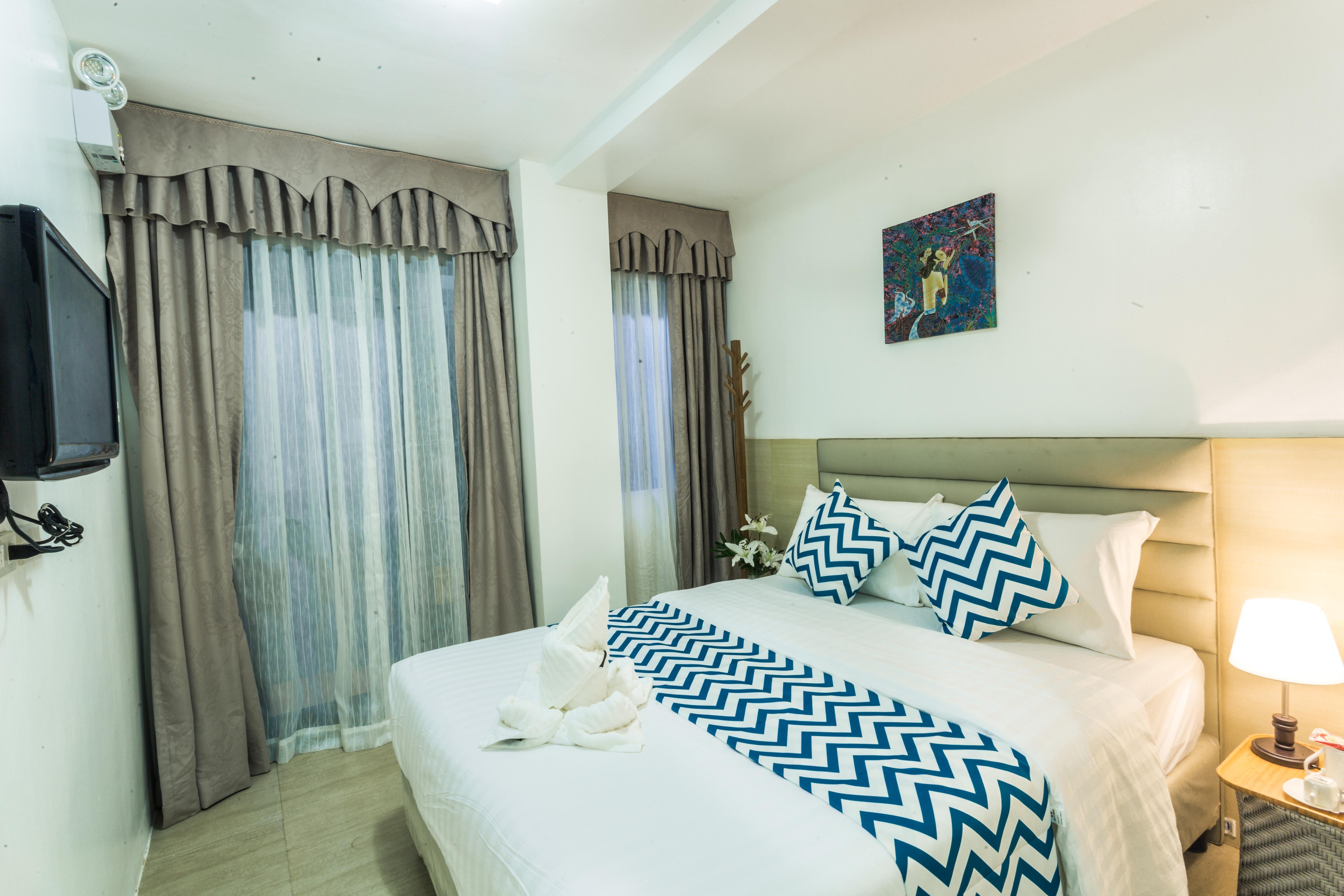 Grand Blue Beach Hotel Manoc-Manoc Buitenkant foto
